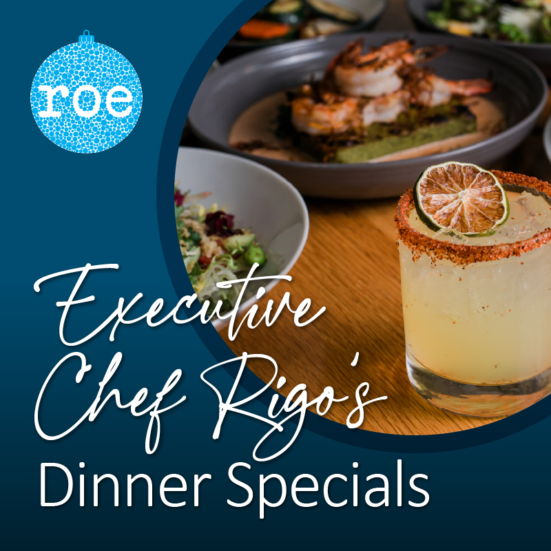 Close-up of a fancy cocktail with lime and assorted plated dishes on a wooden table; text promoting dinner specials.